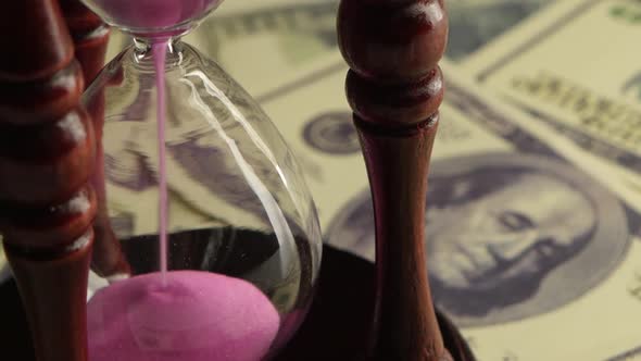 Glass Clock with Sand. Close Up alt