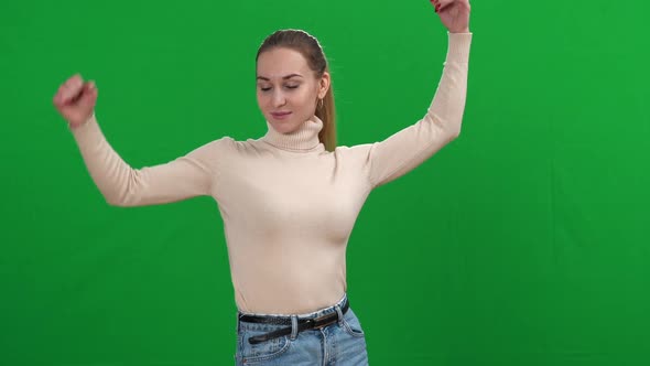 Proud Confident Slim Woman Making Strength Gestures at Chromakey Background Looking at Camera alt