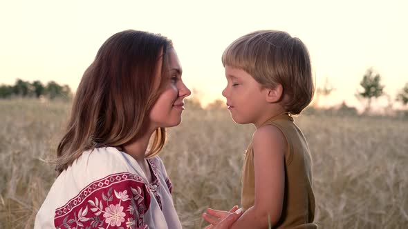 Ukrainian Family  Loving Smiling Son with Mom alt