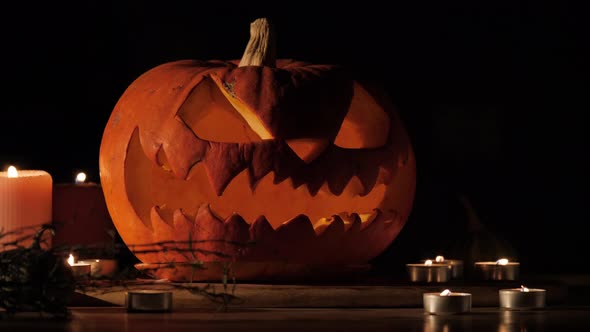 Shining Jack-O-Lantern. Halloween Pumpkin with Scary Face