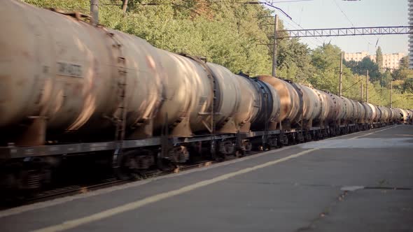 Transportation Cargo Train Moving On Platform Station. Kiev City Logistics. Freight Train alt