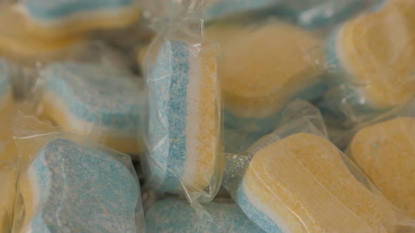 Multi functional washing machine tablets close-up 4K 2160p UltraHD panning footage - Detergent table alt