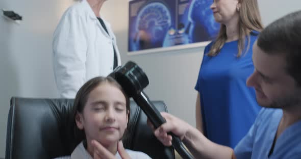 Slow Motion Portrait of Pediatric Neurologist With child Patient in hospital