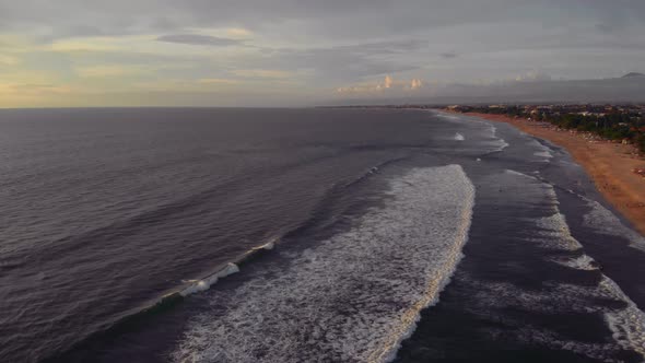 Flight at Sunset Overlooking the Indian Ocean in Bali Indonesia alt