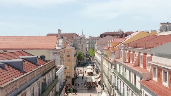 Drone Camera Flying Forwards Above Rua Garrett Street alt