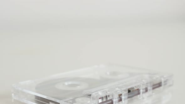 Vintage analogue compact  audio cassette 4K 2160p 30fps UltraHD tilting footage - Transparent   magn