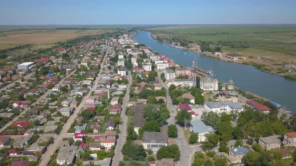 Aerial View Of Sulina City Harbor And The Danube Flowing Into The Black Sea alt