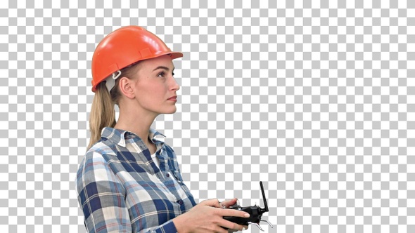 Female engineer operating a drone analyzing object, Alpha Channel