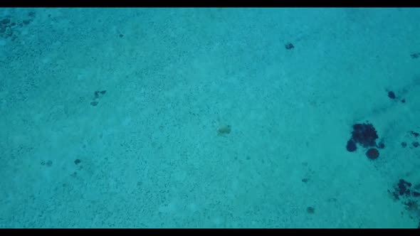 Aerial top view nature of tropical shore beach voyage by blue green water with white sandy backgroun alt