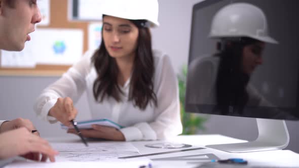 Engineers working on the project. alt