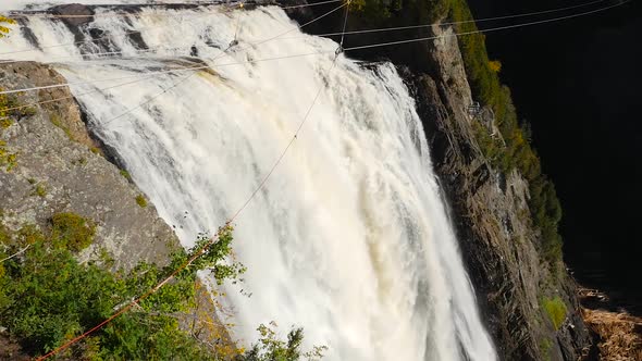 Wide Angle Tilting Down The Montmorency Fall In Quebec To Reveal The Base