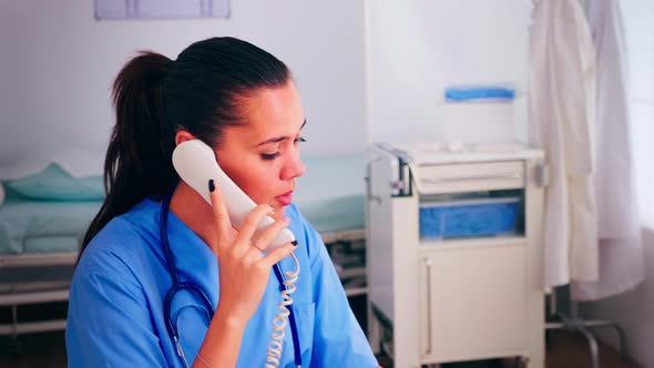 Medical Woman Operator Working in a Medicine Call Centre alt