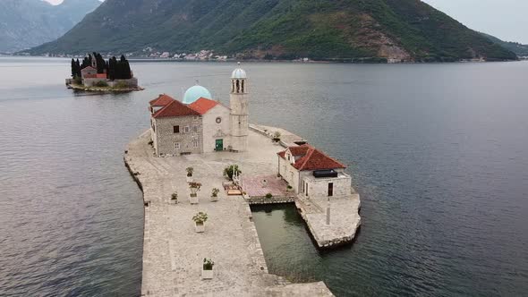 Restored Church with Red Roof and Tower on Island alt