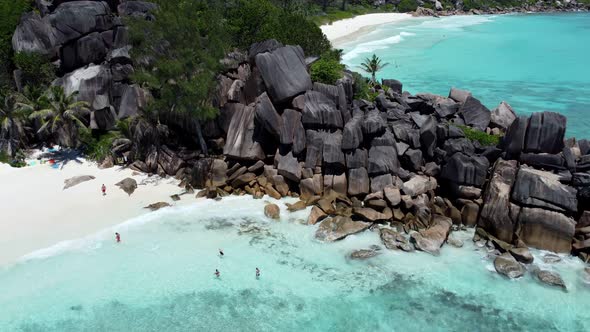 azure beach with big waves from a height