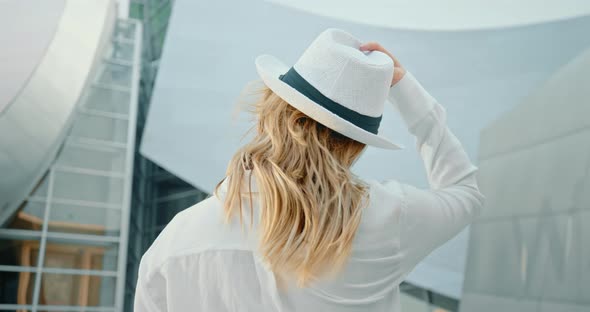 Woman Shaking Hair in Slow Motion . Modern Balayage Hair Color and Hairstyle alt