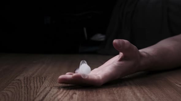 Addict Hand with Syringe Falls to Floor Just Pricked Heroin Drugs Slow Motion alt