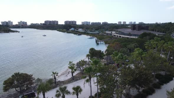 aerial, twisting from Overlook Park to New Pass in Sarasota, Florida alt