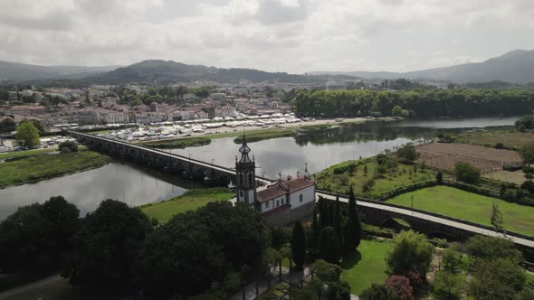 Medieval bridge at Ponte de Lima, Viana do Castelo in Portugal. Aerial circling