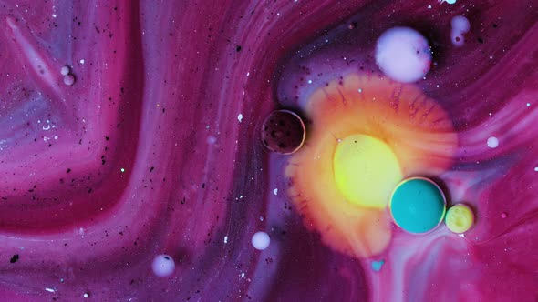 Abstract Acrylic Paint Spread Blast Explode Galaxy. Bright colored bubbles sparkling. alt