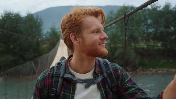 Joyful Tourist Face Enjoy Walk on River Bridge alt