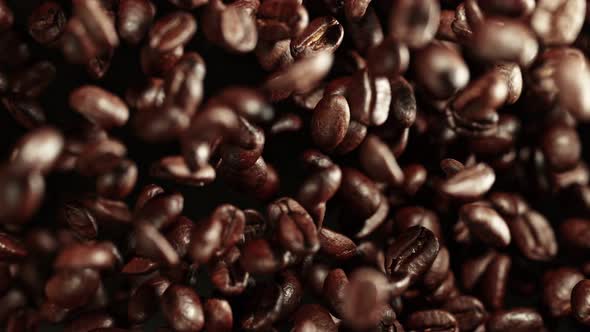 Super Slow Motion Shot of Exploding Premium Coffee Beans Towards the Camera at 1000Fps alt