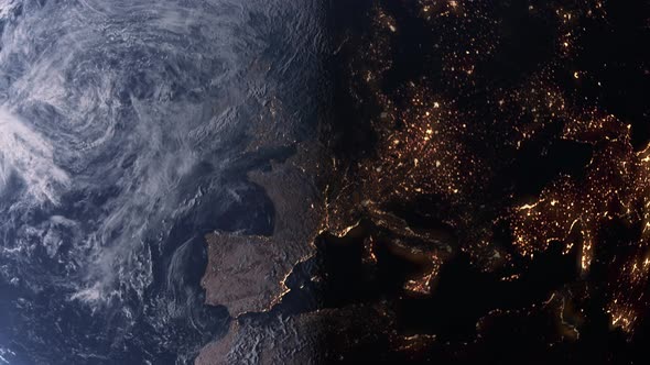 Day to night looking down on the Earth at Europe