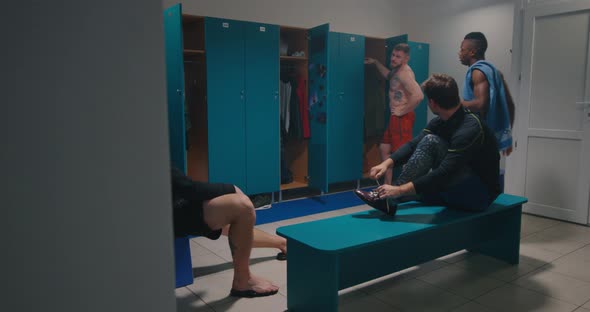 Men Laughing in Locker Room alt