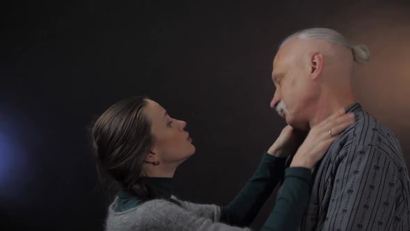 Angry Woman Touches Pensioner Head Shirt and Resents alt