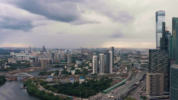 Aerial Drone Zoom in of Moscow Suburban Panorama Under Cloudy Sky