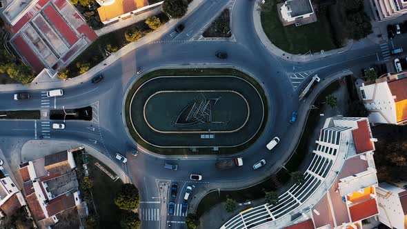 Roundabout with cars aerial view.