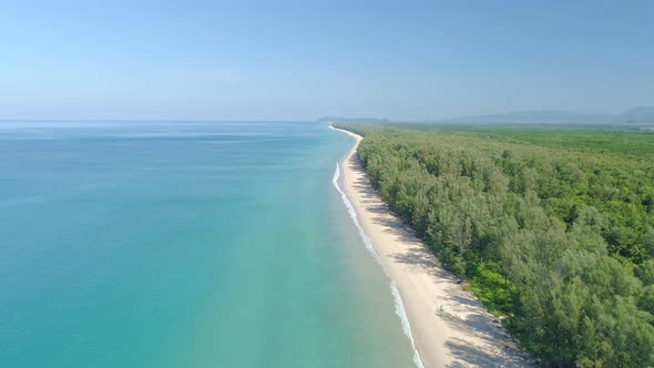 Aerial view Top view of Beautiful tropical sea sandy beach and waves crashing against sand beach alt