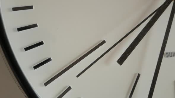 Stuck Second Hand Of A Broken White Wall Clock Ticks Repeatedly, Close Up Shot alt