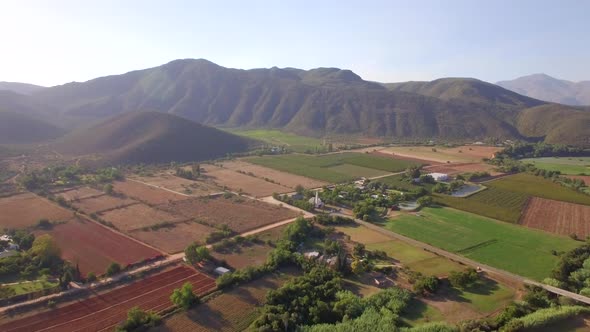 Aerial travel drone view of Oudtshoorn, Western Cape, South Africa. alt