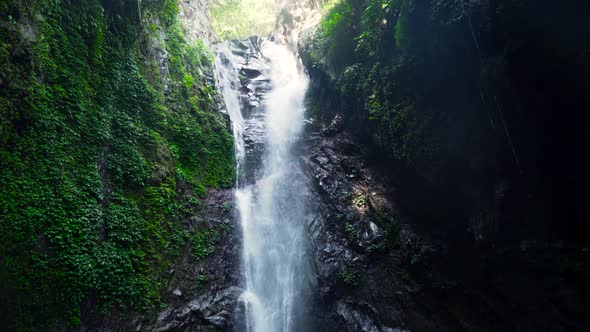 Beautiful Tropical Waterfall. alt