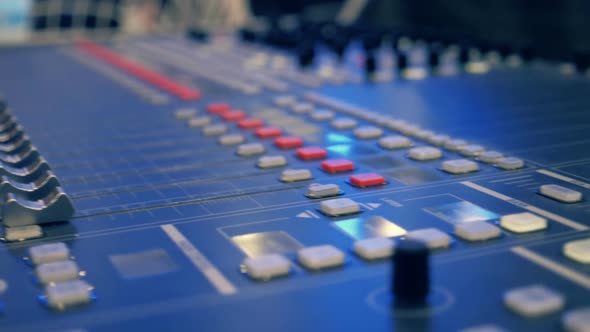 Professional Video Mixing Console Where Many Knobs And Many Reflections. Closeup