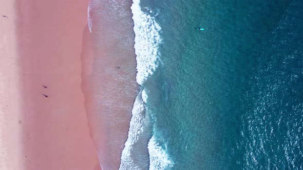Aerial view top view beach and seawater on sandy beach in summer. Nature and travel concept. alt