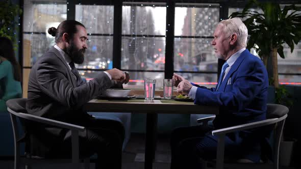 Conversation of Partners During Business Lunch alt