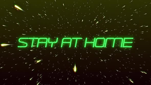 Animation of words Stay At Home written in green neon letters over shiny points floating alt