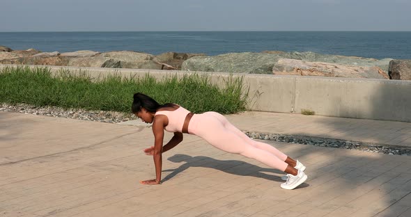 Black fit woman training outdoor. Fitness concept.