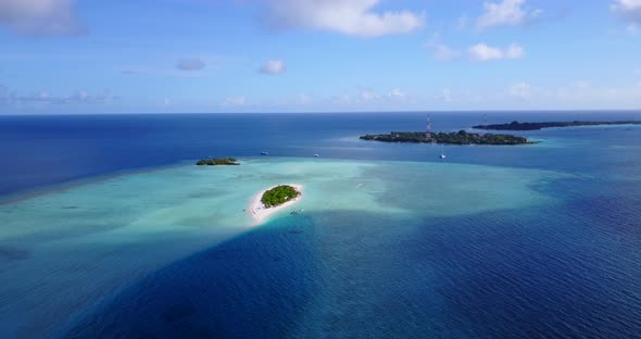 Wide angle above abstract view of a paradise sunny white sand beach and blue water background in hi  alt