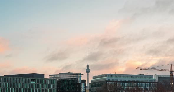 Time lapse of Berlin skyline clouds moving fast, TV Tower Germany alt