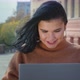 Girl Freelancer Student Typing on Laptop Outdoors Looking for Useful Information for Work or Study - VideoHive Item for Sale
