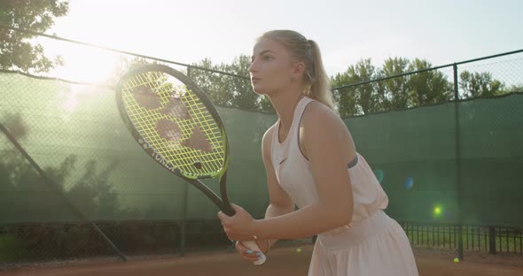 Focused Ambitious Young Sports Player Playing Tennis Lens Flare Sun Slow Motion