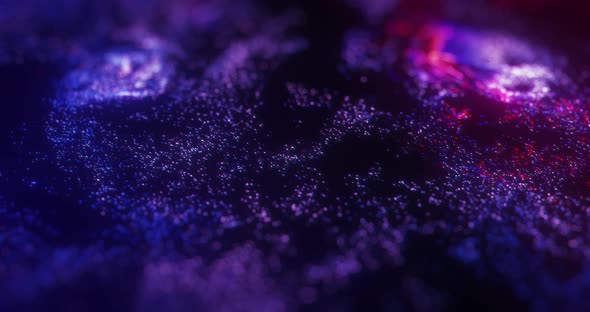 abstract motion of Neon purple and red particles with bokeh.