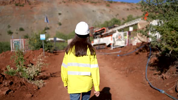 Female Engineer Working in Gold Mine alt