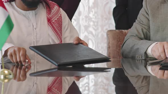 Diplomats From Different Countries Signing Contract alt