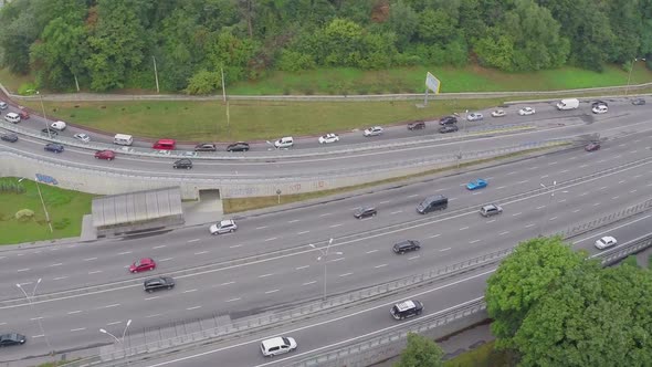 Cars Driving Slowly Down the City Road, Traffic Jam Aerial alt