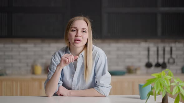 Beautiful Smiling Confident Young Woman Pretty Face Looking at Camera Posing Alone at Home in Office alt