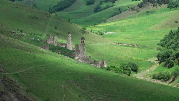 Medieval Tower Complex in Mountains alt