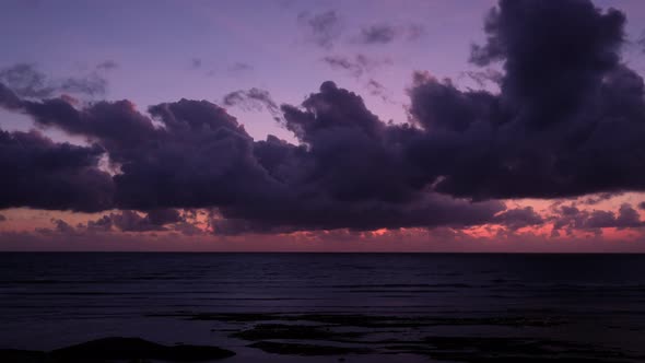 Time lapse of sunrise sky on the beach